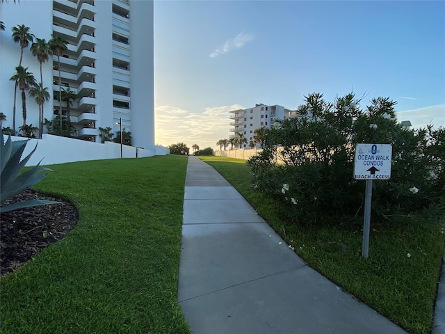 surrounding community featuring a yard