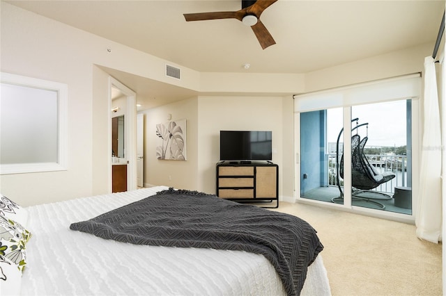 carpeted bedroom featuring ceiling fan and access to exterior