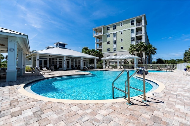 view of pool featuring a gazebo and a patio