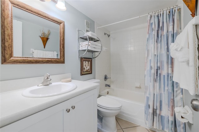 full bathroom featuring toilet, shower / bath combination with curtain, vanity, and tile patterned floors