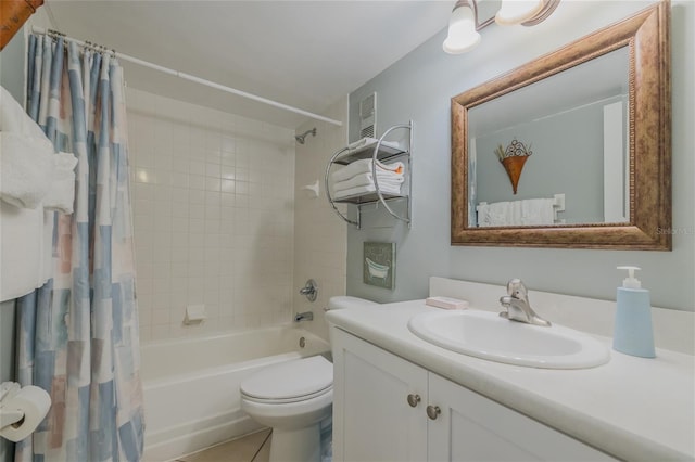 full bathroom featuring tile patterned floors, vanity, toilet, and shower / bathtub combination with curtain