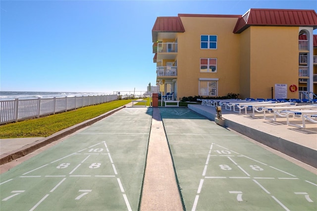 view of home's community with a water view