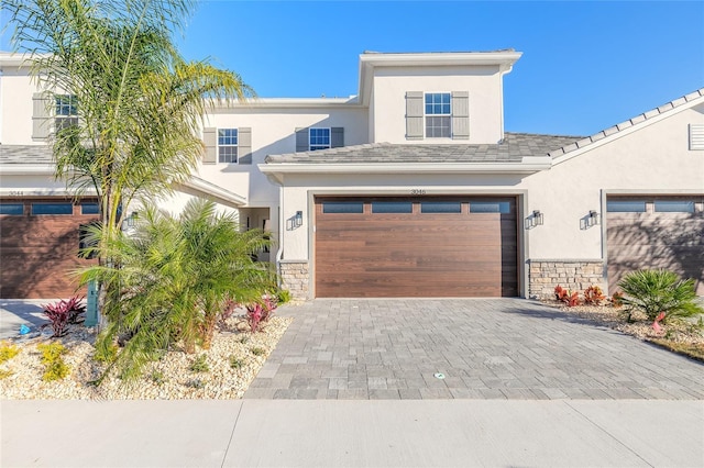 view of front of home with a garage