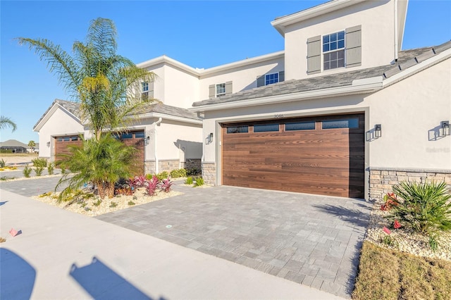 view of front of property featuring a garage