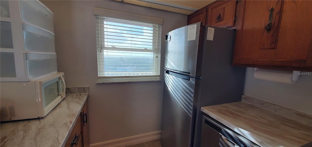 kitchen with stainless steel fridge