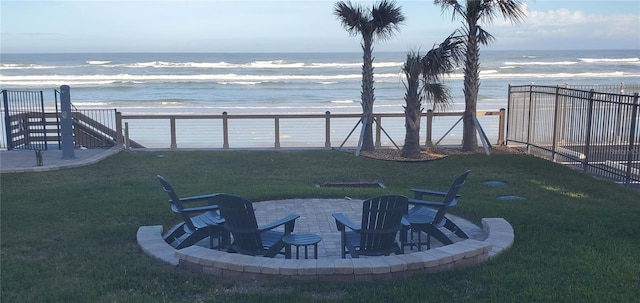 view of yard with a patio area and a water view