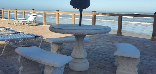 view of patio featuring a water view