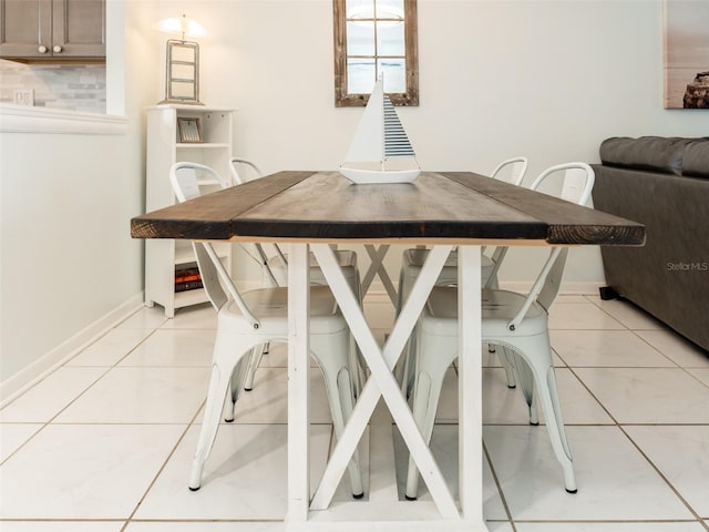 dining room featuring light tile patterned flooring