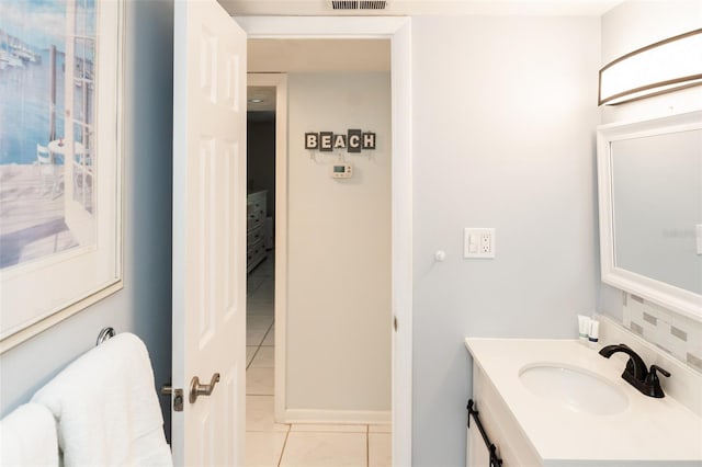 bathroom featuring vanity and tile patterned floors