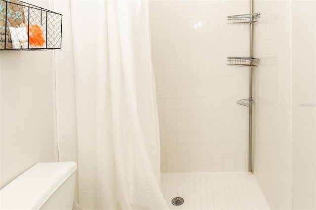 bathroom with a shower with shower curtain