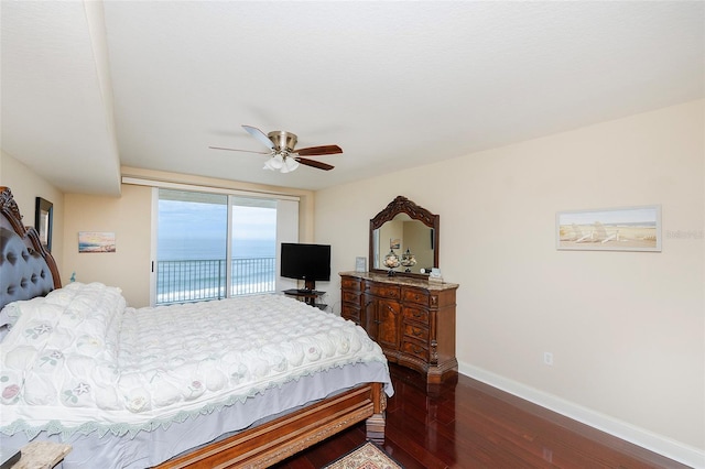 bedroom featuring ceiling fan, access to outside, and dark hardwood / wood-style floors