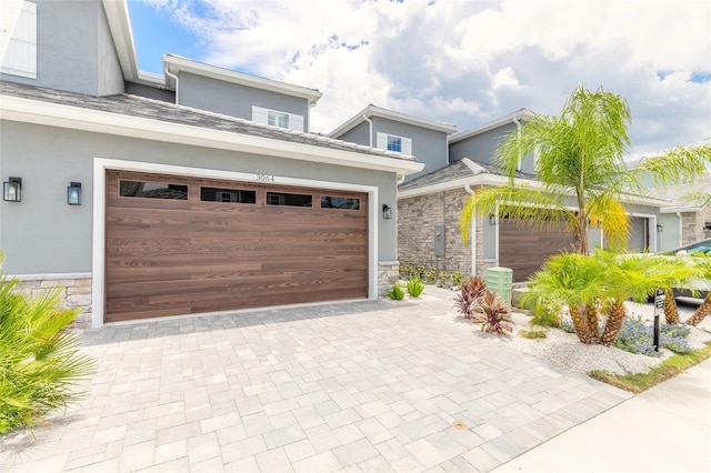 view of front of property featuring a garage