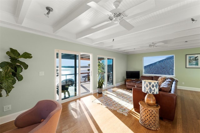 living room with beam ceiling, ceiling fan, and wood-type flooring