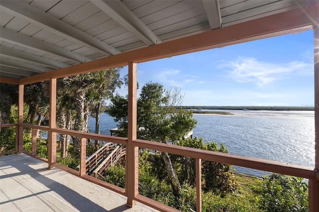 deck featuring a water view