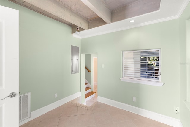 unfurnished room featuring crown molding, beamed ceiling, light tile patterned flooring, and wooden ceiling