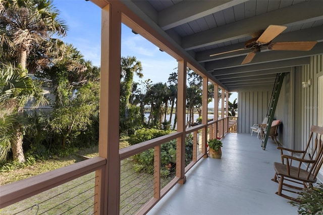 balcony with a porch and a ceiling fan
