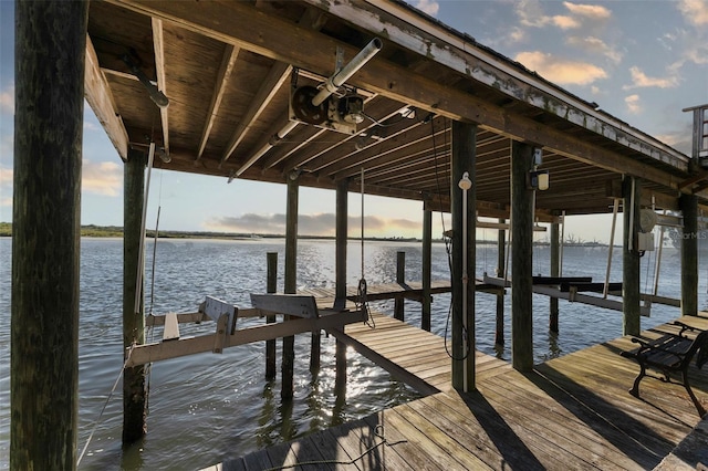 view of dock with a water view and boat lift