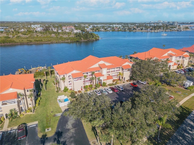 birds eye view of property featuring a water view