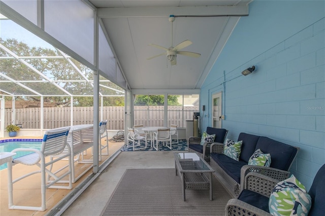 sunroom / solarium with vaulted ceiling