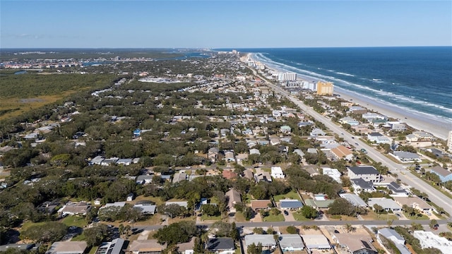 bird's eye view featuring a water view, a residential view, and a beach view