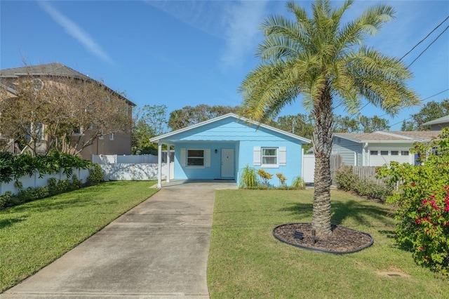 view of front of house featuring a front yard and fence