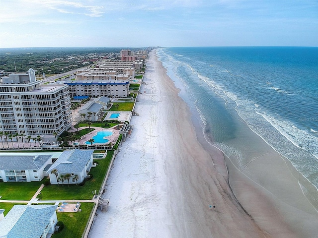 aerial view with a view of the beach and a water view