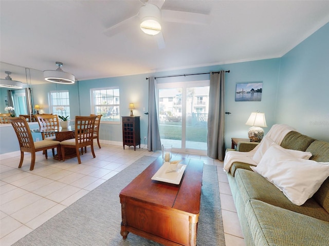 tiled living room featuring ceiling fan