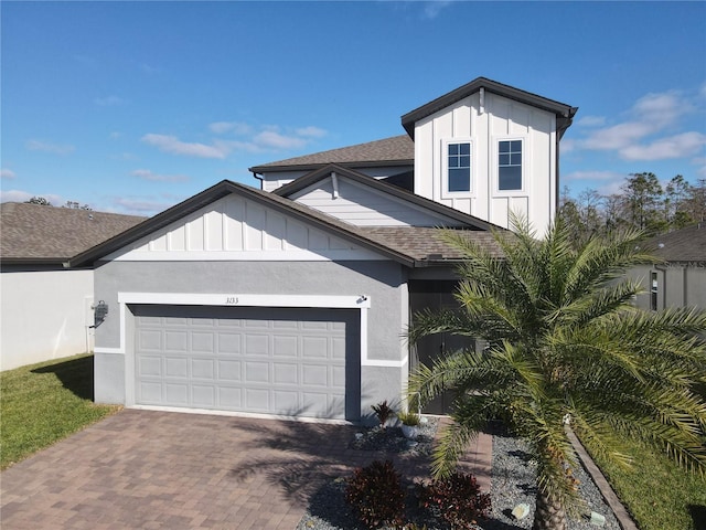 view of front of property featuring a garage