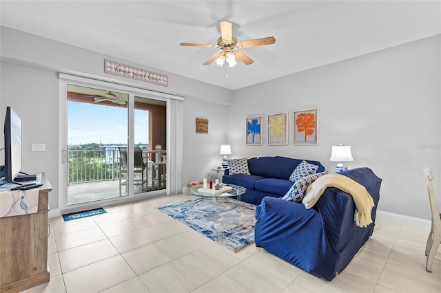 living room with light tile patterned floors and ceiling fan