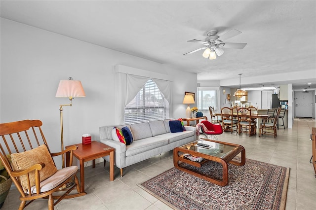 living room featuring ceiling fan