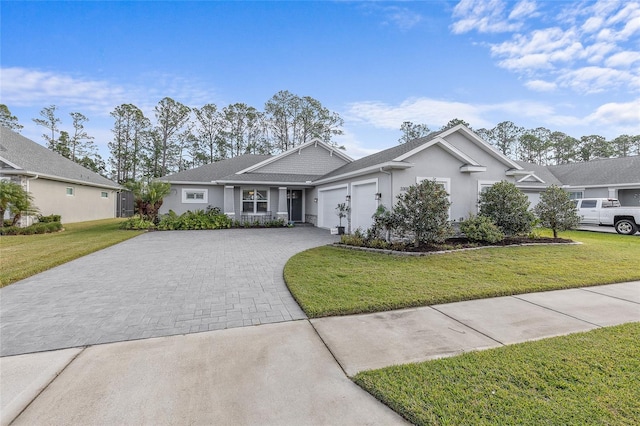 ranch-style home with a garage and a front yard