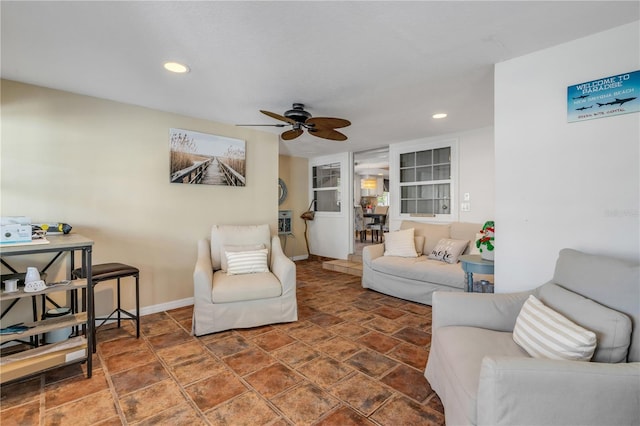 living room with ceiling fan