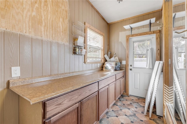 interior space featuring wood walls