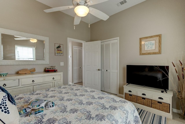 bedroom featuring ceiling fan and lofted ceiling