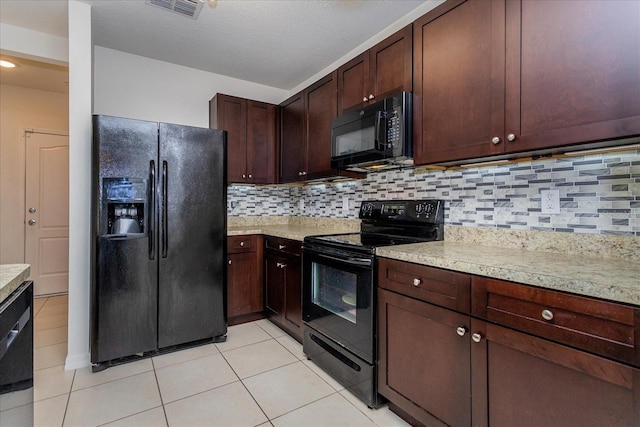 kitchen with tasteful backsplash, dark brown cabinets, light tile patterned floors, and black appliances