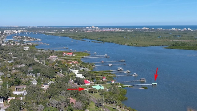 birds eye view of property featuring a water view