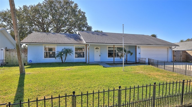 single story home with a garage and a front lawn