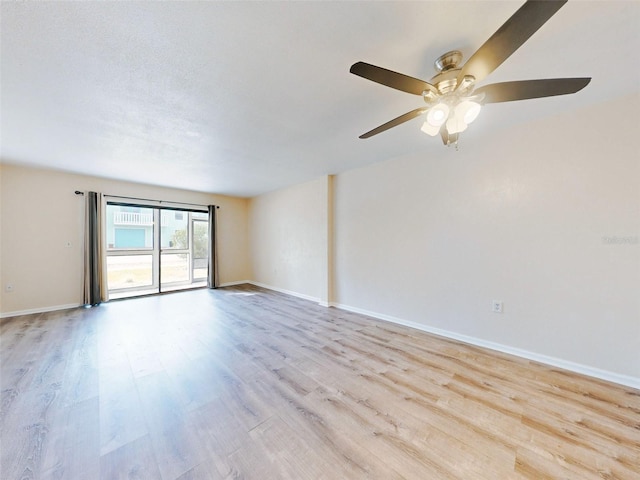 unfurnished room featuring ceiling fan and light hardwood / wood-style floors