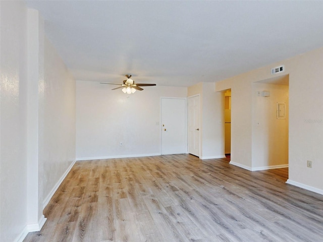 unfurnished room featuring ceiling fan and light hardwood / wood-style floors