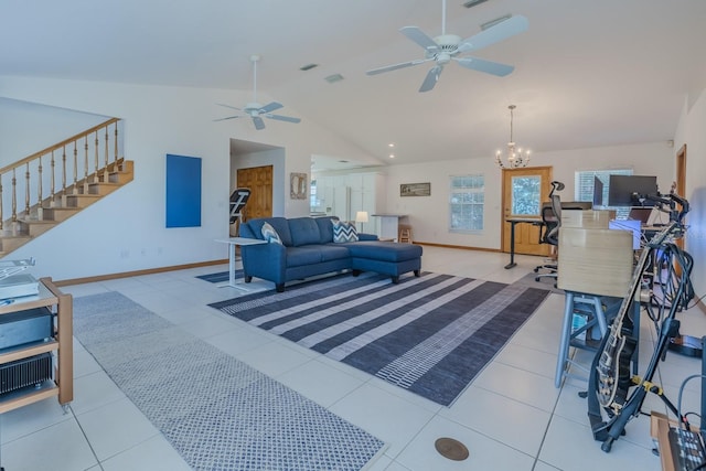 tiled living room featuring ceiling fan with notable chandelier and lofted ceiling