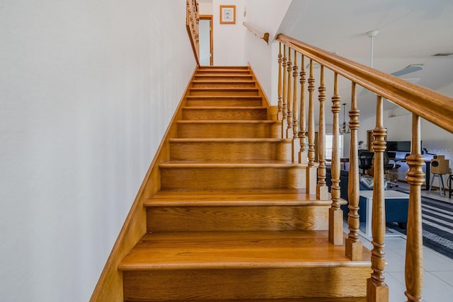 staircase with tile patterned flooring