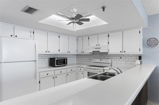 kitchen featuring sink, white cabinets, white appliances, and ventilation hood