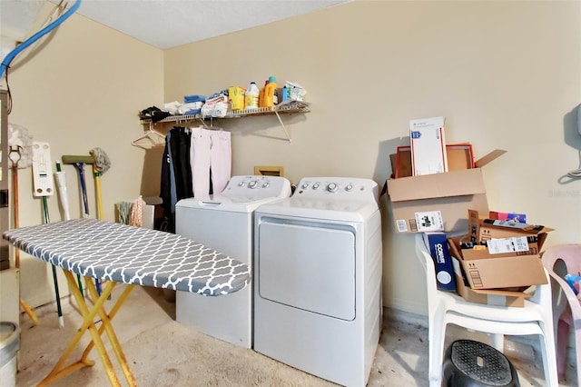 laundry area with separate washer and dryer