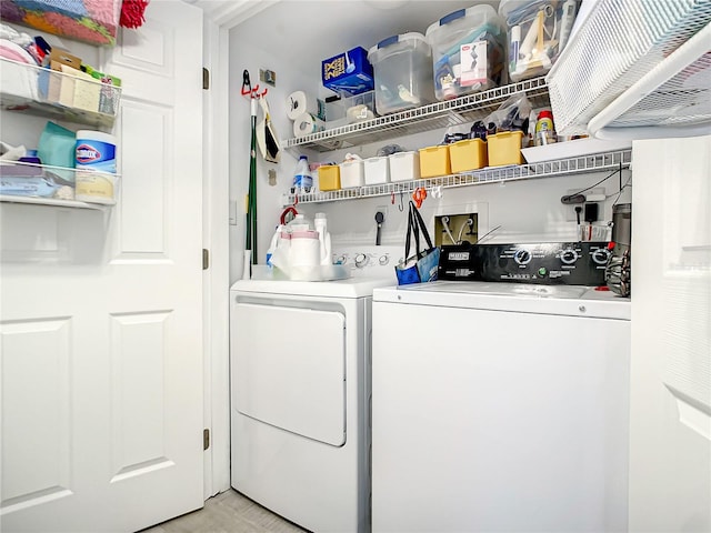 laundry room with washer and clothes dryer