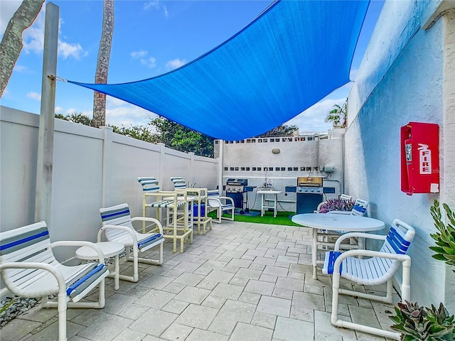 view of patio with area for grilling