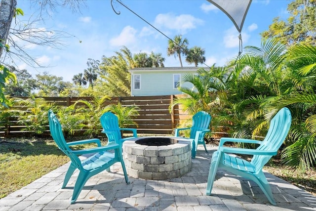 view of patio / terrace featuring a fire pit