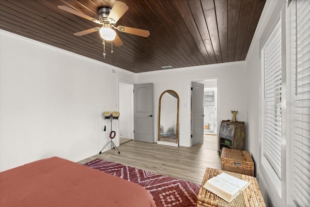 bedroom with ensuite bathroom, wood ceiling, ceiling fan, and light hardwood / wood-style flooring