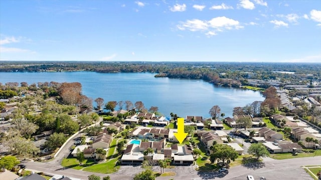 bird's eye view featuring a residential view and a water view