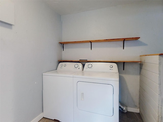 laundry area with separate washer and dryer