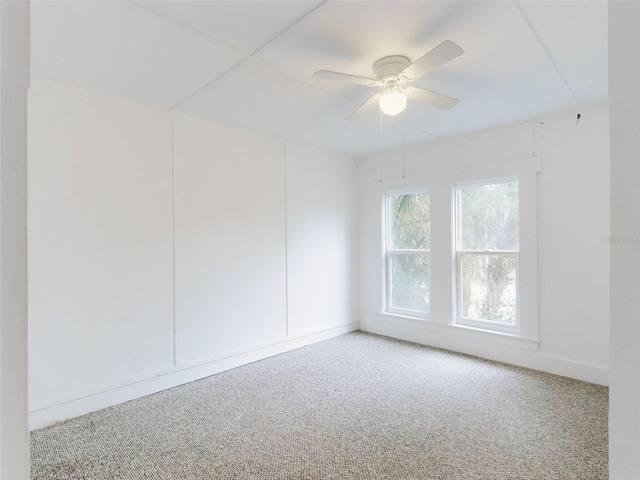 unfurnished room with carpet floors and ceiling fan